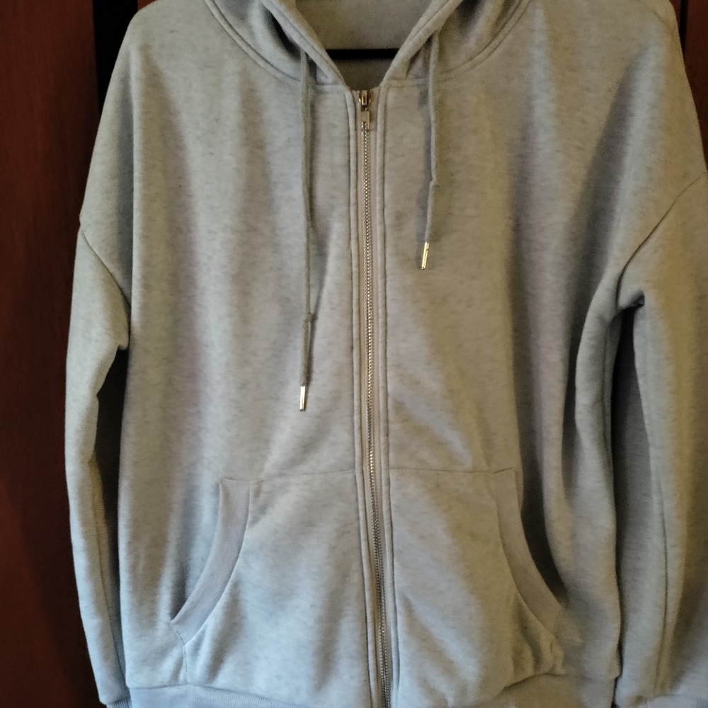 light blue sweat jacket
